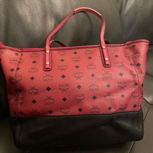 Authentic Pink and Black large MCM shopper. Good condition.